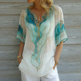 Winter V‑Neck Top Blau mit Goldprint – Elegant & Cozy